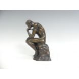 After Auguste Rodin (1840-1917), a patinated bronze sculpture 'The Thinker', by J. Gillespie, signed