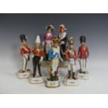 A Capodimonte style porcelain figure of a Napoleonic Soldier, modelled on a stepped plinth with