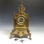 A late 19th century French gilt brass Gothic revival style Mantel Clock, the architectural case with