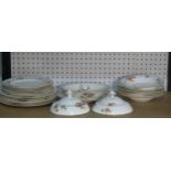 A Royal Worcester part Dinner Service, decorated with floral swags, comprising Platter, Serving