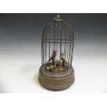 A 20th century Reuge Music (Sainte-Croix, Switzerland) Caged Songbirds Music Box Automaton, with two
