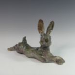 Lawson E. Rudge (b. 1936), a raku fired studio pottery sculpture of a Hare, modelled cross legged, L