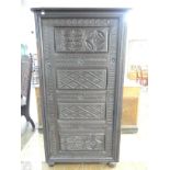 An antique carved oak Cupboard, with heavily carved decoration, W x D x H cm.