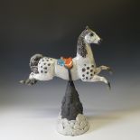 Lawson E. Rudge (b. 1936), a raku fired studio pottery sculpture of a Carousel Horse, numbered 5