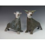 Lawson E. Rudge (b. 1936), a pair of raku fired studio pottery sculptures of Bulls, both with