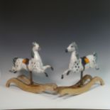 Lawson E. Rudge (b. 1936), a pair of raku fired studio pottery sculptures of Carousel Horses, one