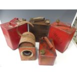 Four vintage petrol cans, including two BP cans marked SM & BP Ltd, a Shell Motor Spirit can and a