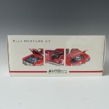 An Auto Art 1:18 scale model of a Ford Mustang GT, red with white stripe, boxed.