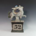 Lawson E. Rudge (b. 1936), a raku fired studio pottery sculpture Centaur on Pedestal Base,