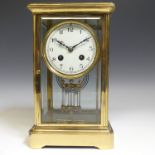 A French git brass Four Glass Mantle Clock, by Japy Freres & C’ie, No. 1310, the white enamel dial