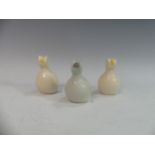 Lawson E. Rudge (b. 1936), a pair of studio pottery Salt Pots, modelled as drumsticks, H 11cm,
