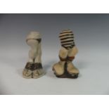 Lawson E. Rudge (b. 1936), a pair of studio pottery Salt and Pepper Pots, in the form of rugby boots