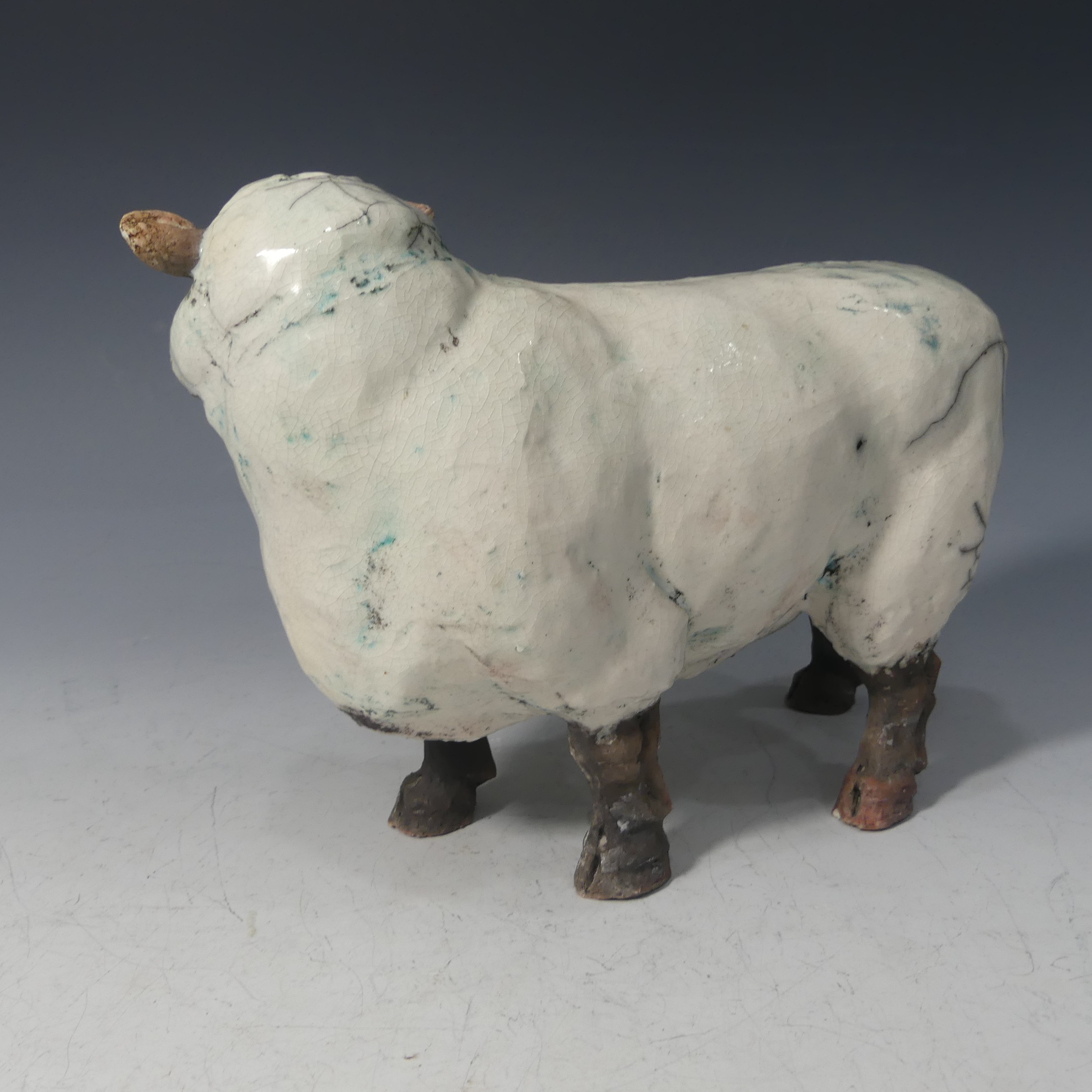 Keza Rudge (British 20th Century), a pottery model of a Sheep, signed K Rudge, L 28cm x H 22cm. - Image 3 of 7