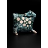Lawson E. Rudge (b. 1936), a raku fired studio pottery sculpture of a Cow, with textured blue