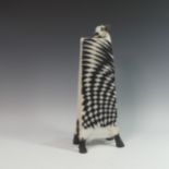Lawson E. Rudge (b. 1936), a raku fired studio pottery sculpture of an elongated Cow, with chess