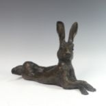 Lawson E. Rudge (b. 1936), a cold cast bronze resin sculpture of a Hare, with crossed legs, L