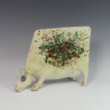 Lawson E. Rudge (b. 1936), a raku fired studio pottery sculpture of a Grazing Cow, numbered 552,