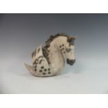 Lawson E. Rudge (b. 1936), a raku fired studio pottery sculpture of a Horse, modelled as half