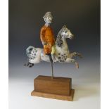 Lawson E. Rudge (b. 1936), a raku fired studio pottery sculpture of George Stubbs, modelled riding a