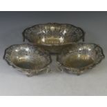 A set of three George V silver Baskets, by William Comyns & Sons Ltd., hallmarked London 1920, of