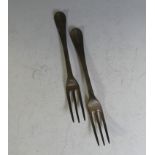 A pair of George I silver Hanoverian three pronged Forks, Britannia standard, hallmarked London