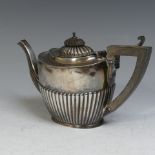 A George V silver Teapot, by William Aitken, hallmarked Birmingham, 1910, of oval form with demi-