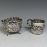 A Victorian silver Mug, by Josiah Williams & Co., hallmarked London, 1894, demi-fluted with a