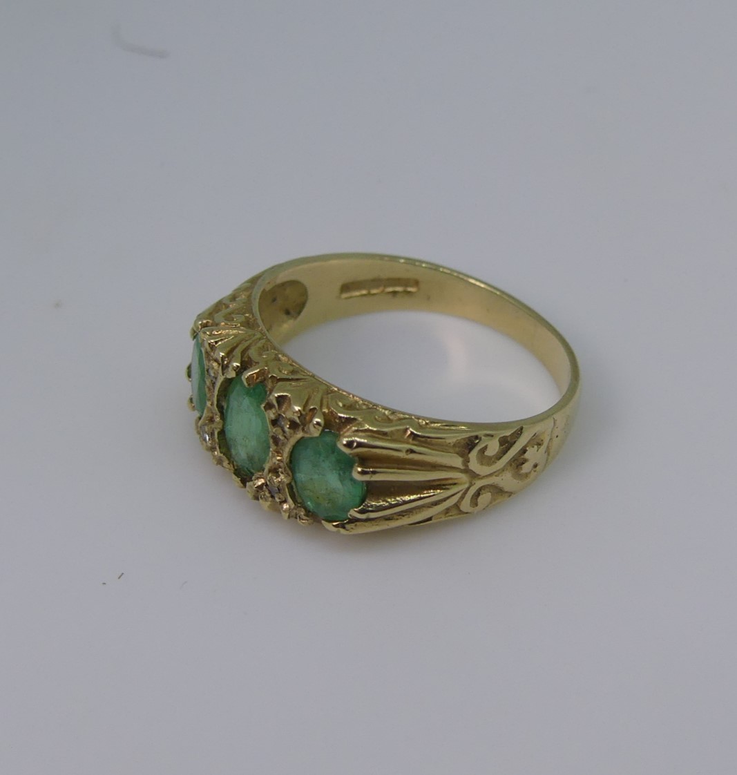 A three stone emerald Ring, mounted in 9ct yellow gold, Size M, 3.1g, together with a small five - Image 6 of 7