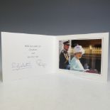 H.M.Queen Elizabeth II and H.R.H.The Duke of Edinburgh, signed 2005 Christmas card with twin gilt