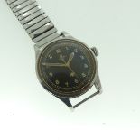 OMEGA, a 1950s military issue stainless steel Wristwatch, the black dial with Military 'fat' broad