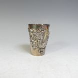 An early 20thC Chinese export silver Beaker, of plain conical form chased with a scrolling dragon,