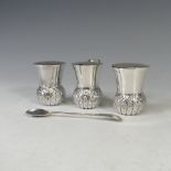 A novelty George V Scottish silver three piece Cruet Set, by Hamilton & Inches, hallmarked Edinburgh