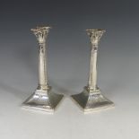 A near pair of silver Column Candlesticks, by Thomas Bradbury & Sons Ltd., hallmarked London 1903