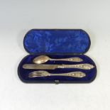 A cased Victorian silver Knife, Fork and Spoon Set, by Martin, Hall & Co., hallmarked Sheffield,