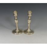 A pair of George V silver Candlesticks, by Adie Brothers Ltd., hallmarked Birmingham, 1927, with a