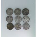 A collection of nine 19thC American silver 'Morgan' Dollars; 1878, 1879, 1880 (New Orleans mint