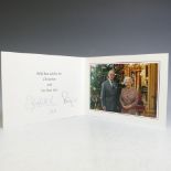 H.M.Queen Elizabeth II and H.R.H.The Duke of Edinburgh, signed 2010 Christmas card with twin gilt