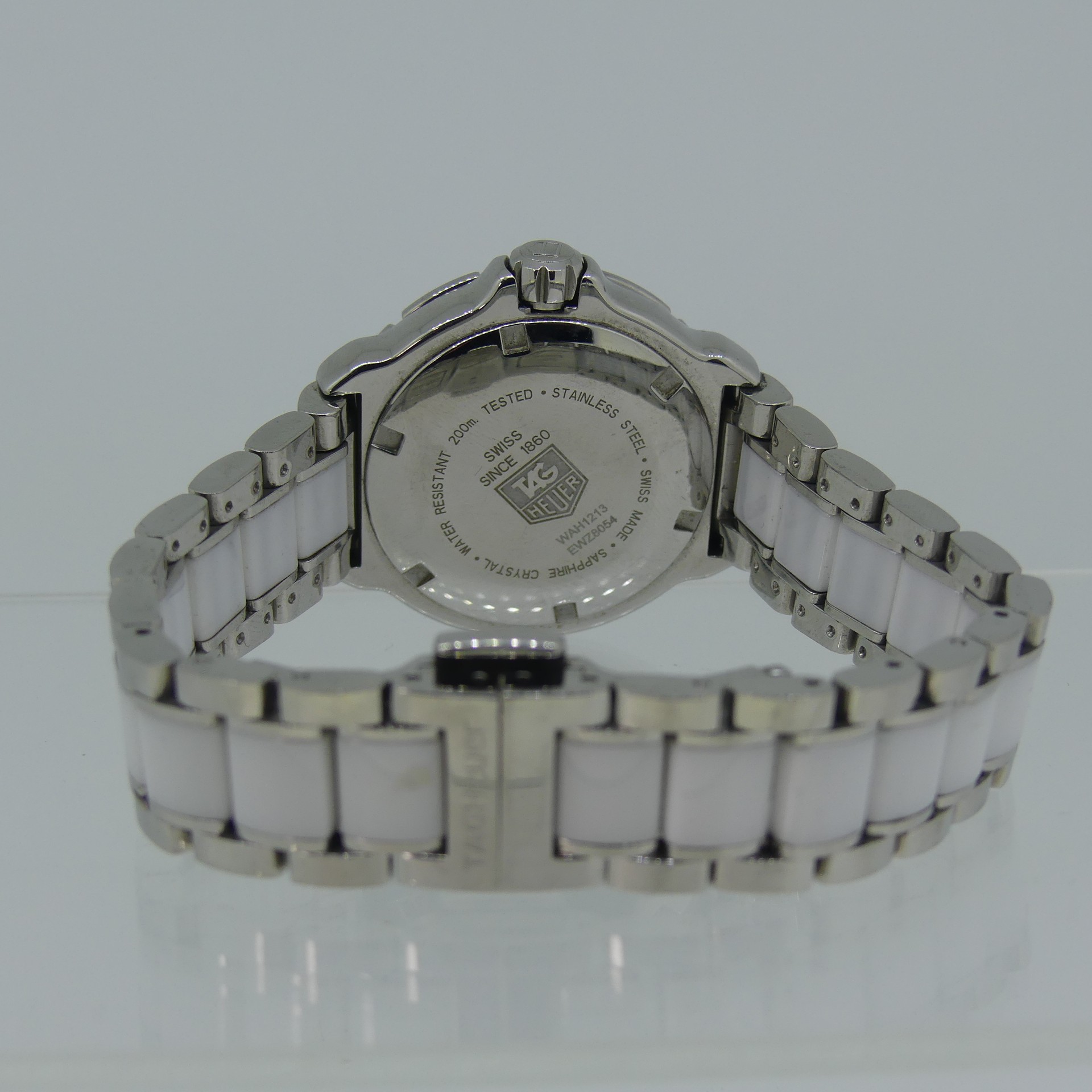 Tag Heuer : a lady's stainless steel and white ceramic Formula 1 ‘Sparkling’ quartz bracelet - Image 5 of 6