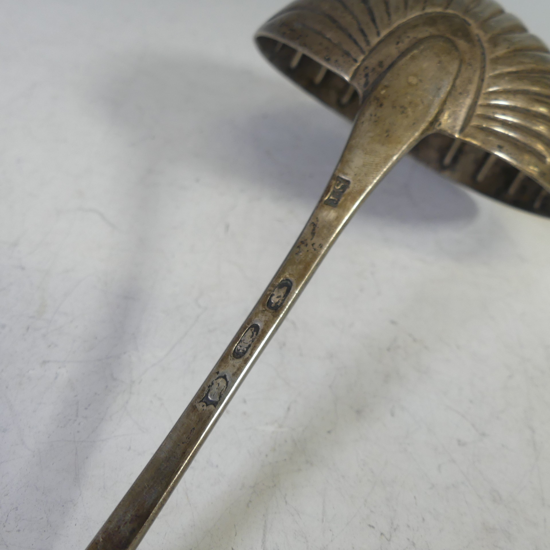 A George III Irish Silver Soup Ladle, by John Shiels, hallmarked Dublin 1774, Celtic point with - Image 4 of 5