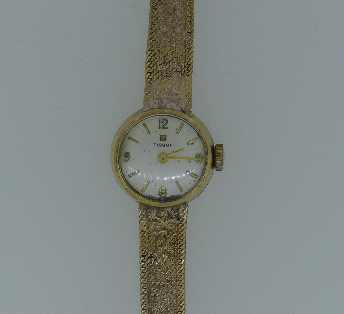 A 9ct yellow gold lady's Tissot Wristwatch, with Swiss 17jewels movement, on an integral damaged 9ct - Image 3 of 6