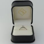 A diamond solitaire Ring, the brilliant cut stone approx. 0.33ct, four claw set in platinum, Size K,