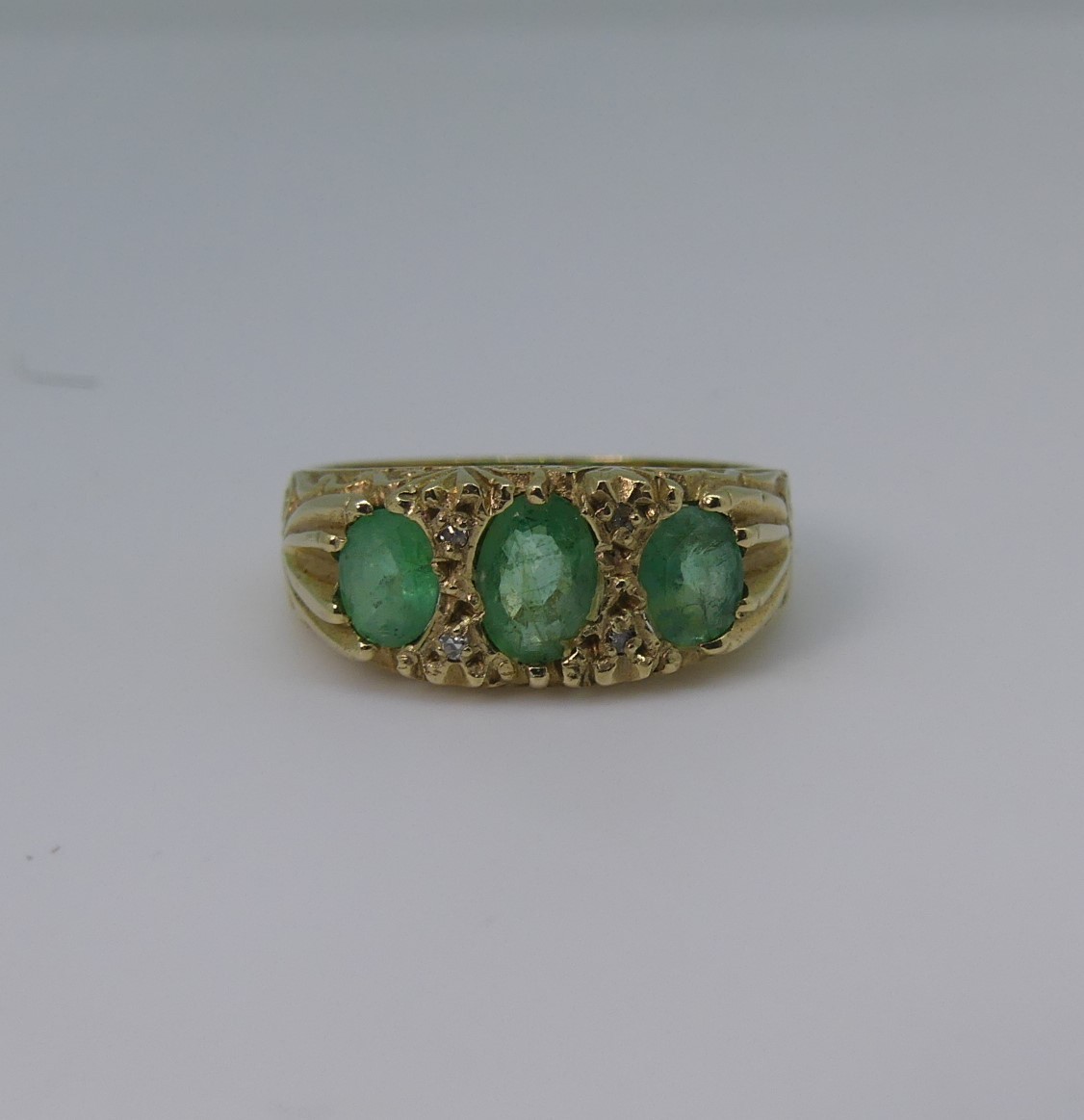 A three stone emerald Ring, mounted in 9ct yellow gold, Size M, 3.1g, together with a small five - Image 7 of 7