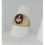 Masonic Interest; A gentleman's Signet Ring, the front with an oval pink ruby inset a set square and