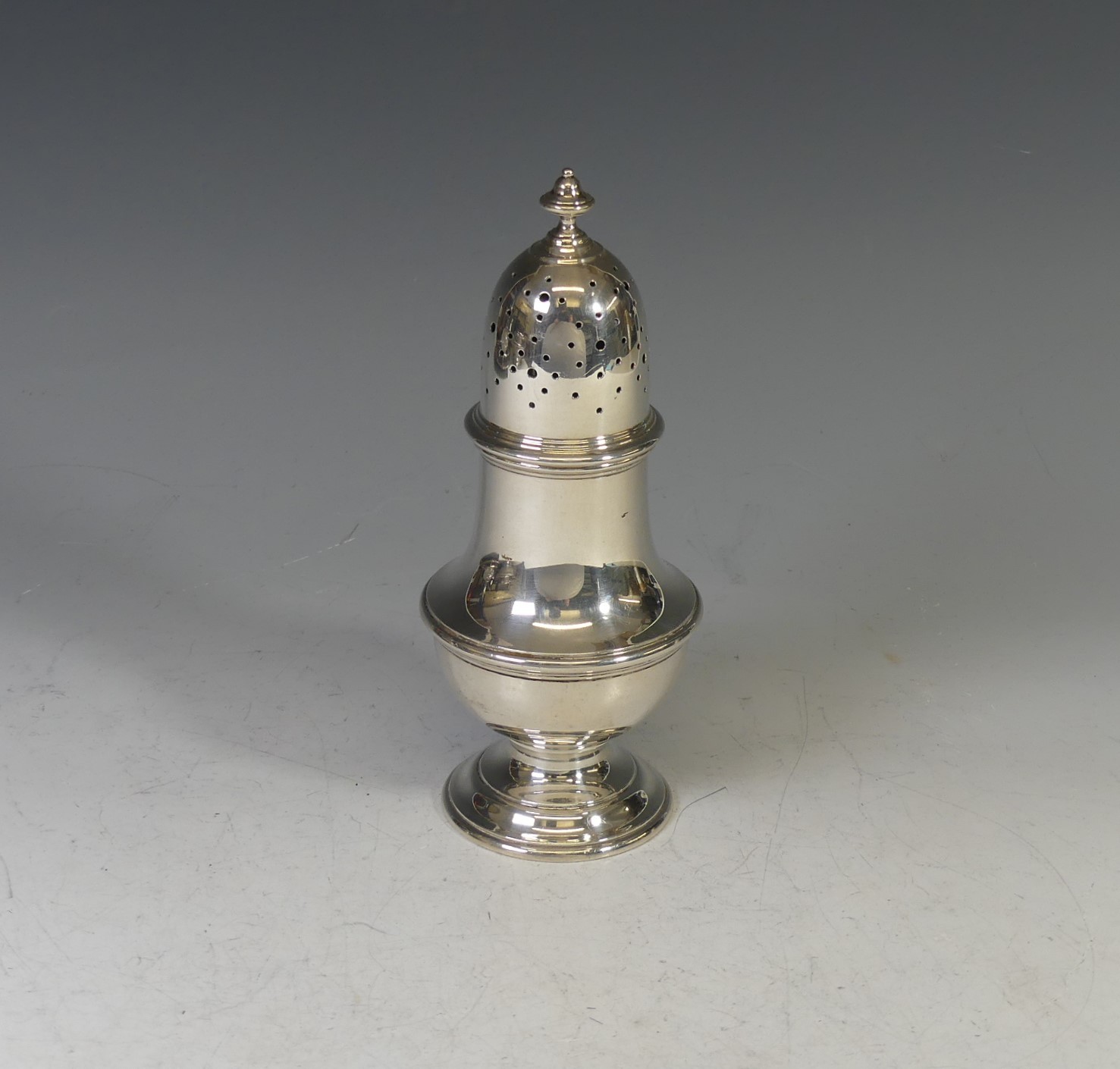 A George VI silver Sugar Caster, hallmarked London 1940, makers mark unclear but with 'Mappin &