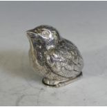 An Edwardian period continental silver novelty Pepper Pot, modelled as a Chick, import marks for