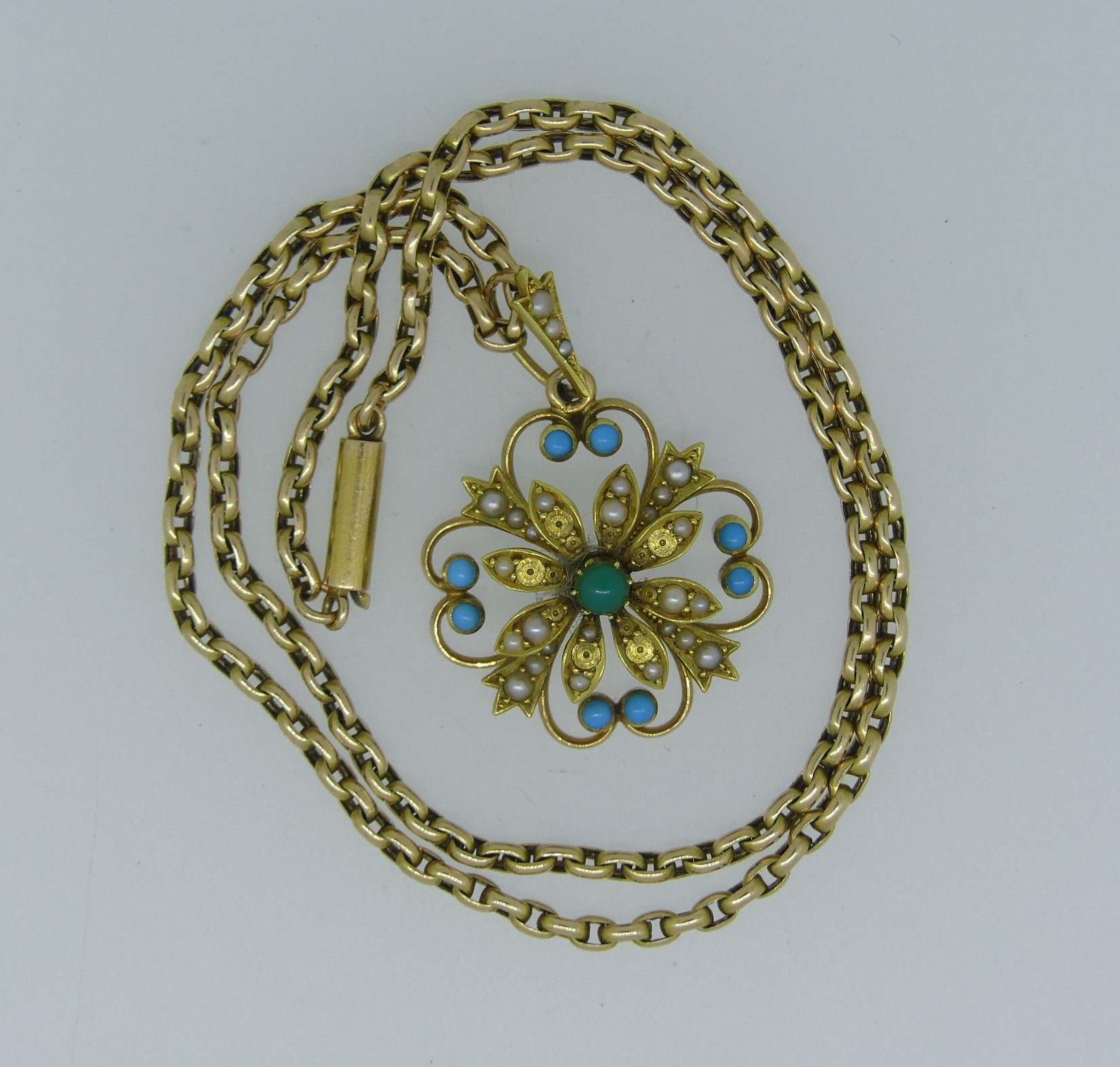 An antique turquoise and seed pearl Pendant, of open foliate form, with seed pearl set suspension - Image 3 of 3