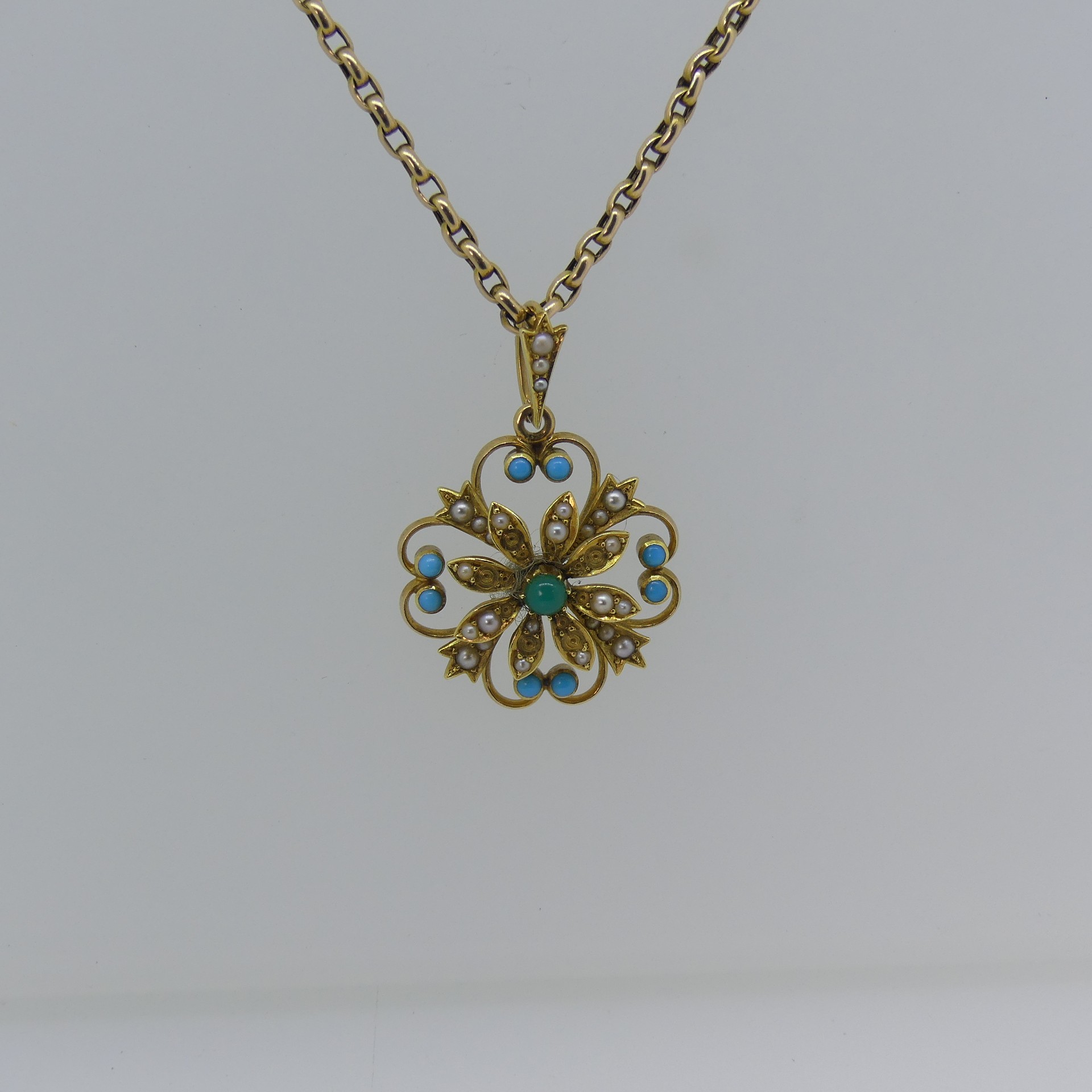 An antique turquoise and seed pearl Pendant, of open foliate form, with seed pearl set suspension - Image 2 of 3