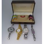 A Gucci lady's quartz Bangle Wristwatch, the case reverse marked 11/12.2 with interchangeable