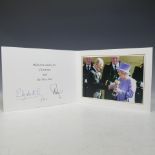 H.M.Queen Elizabeth II and H.R.H.The Duke of Edinburgh, signed 2012 Christmas card with twin gilt
