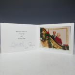 H.M.Queen Elizabeth II and H.R.H.The Duke of Edinburgh, signed 2006 Christmas card with twin gilt